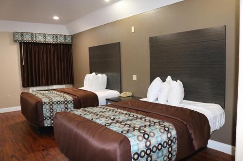 Scottish Inns & Suites Iah Airport-Beltway 8 Aldine Екстер'єр фото
